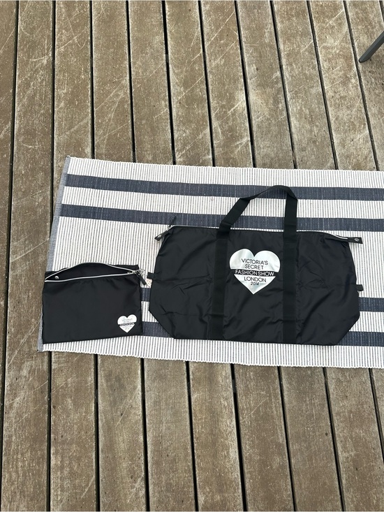 Victoria's Secret Handbags - Victoria's Secret Black Foldable Travel Bag with Holographic Heart Logo